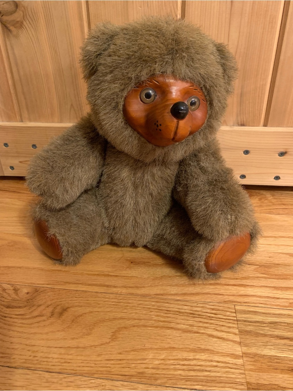 Vintage plush bear with a hand-carved wooden face and paws by Applause